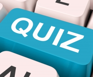 Image of a quiz logo on a computer keyboard